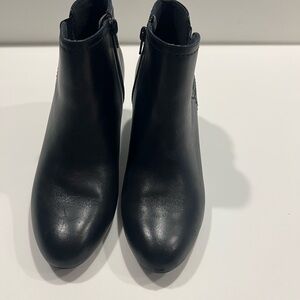 Clarks Collection  Black Ankle Booties with Sleek Design
Clean like new.
